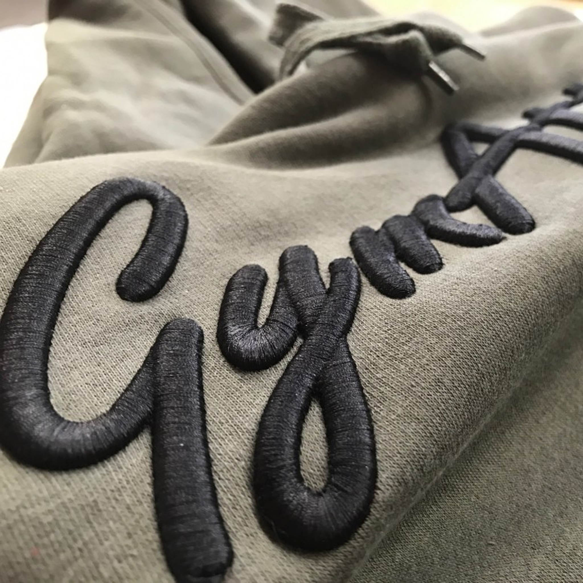 Close-up of raised three-dimensional puff embroidery